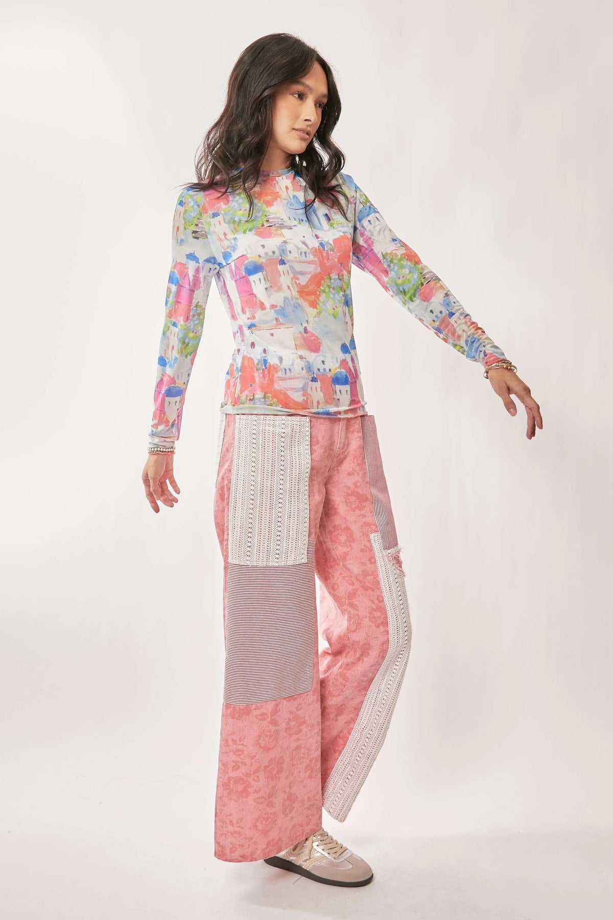 Davi & Dani multi-printed mesh long sleeve round neck top, stylish and lightweight with vibrant pattern details.