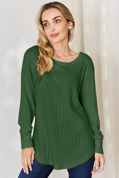 Basic Bae full size ribbed round neck slit T-shirt by Trendsi, shown in black with ribbed fabric and a relaxed fit.