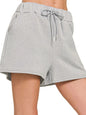 Zenana fleece drawstring short pants with pockets, featuring a comfortable fit and casual style, shown in this image.