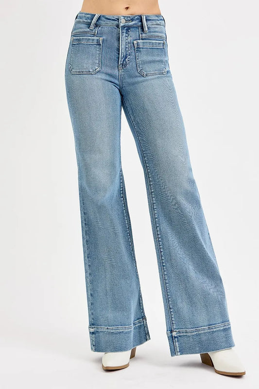 Plus size high-rise wide flare patch pocket jeans by RISEN, featuring a full size fit and fashionable denim design
