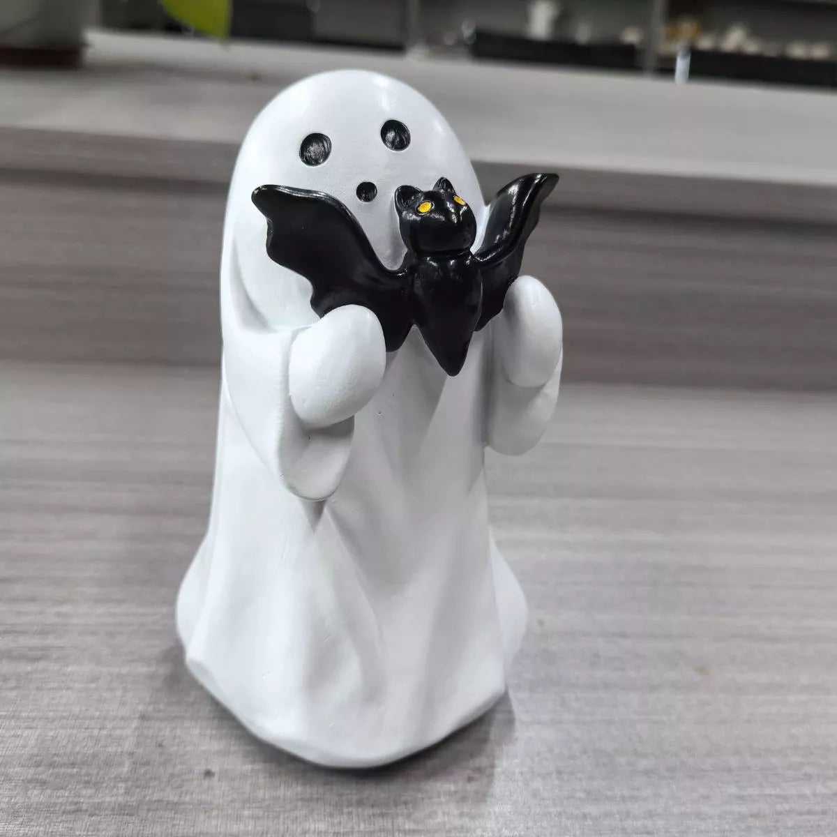 Decorative Halloween ghost ornament by Trendsi, featuring a spooky ghost figure with a ghostly white finish for Halloween decor.