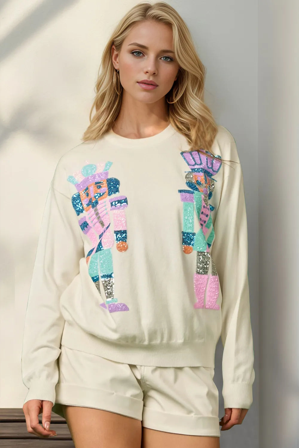 Trendsi Double Take full size sequin Nutcracker long sleeve sweater with festive holiday design and colorful sequins.