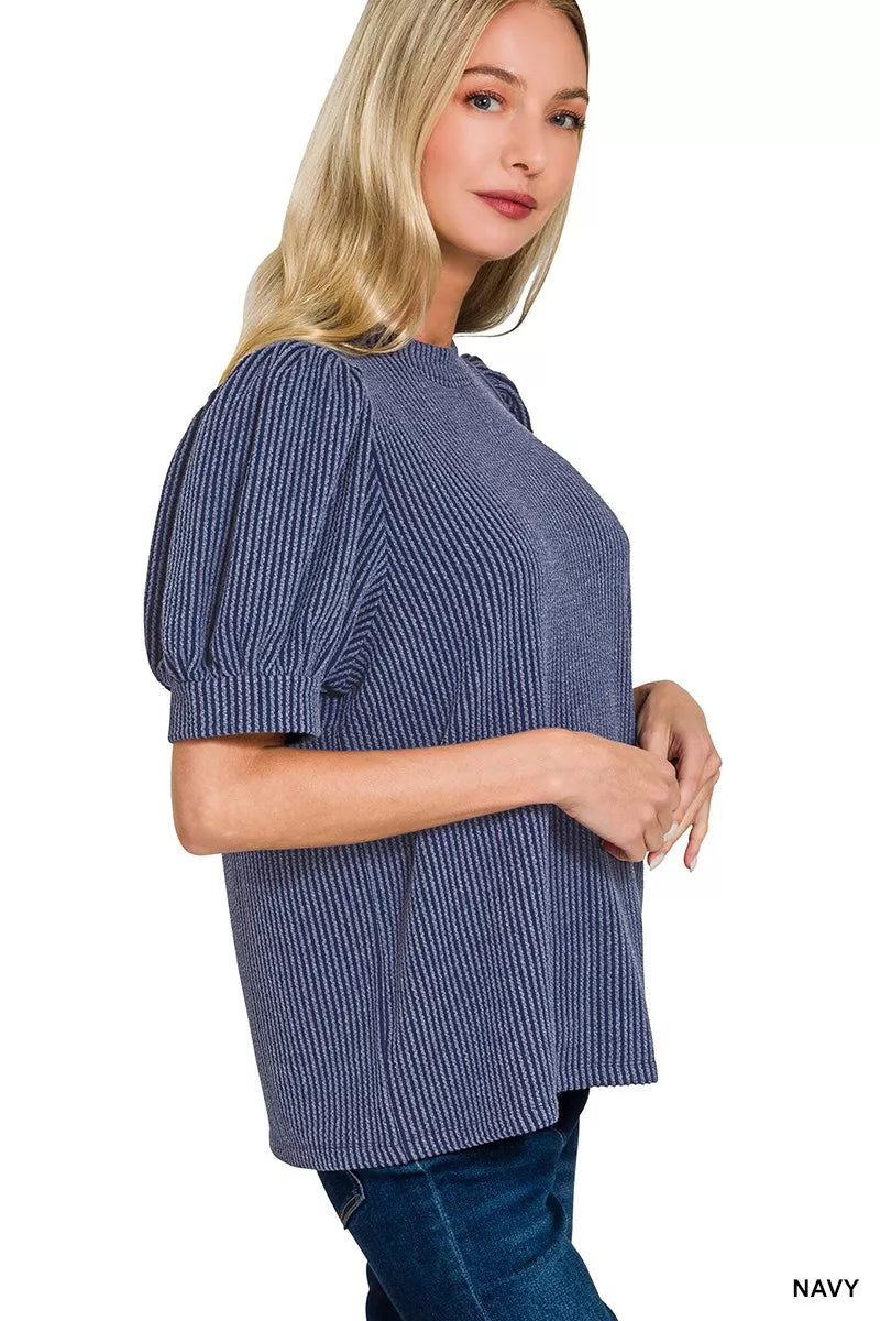 Pink Zenana raised rib puff sleeve top with a fitted silhouette and ribbed texture, featuring stylish puff sleeves.