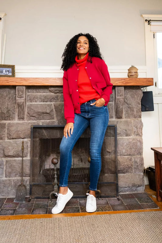 Plus size Judy Blue washed thermal skinny jeans with a full-length fit and distressed details, styled on a model.