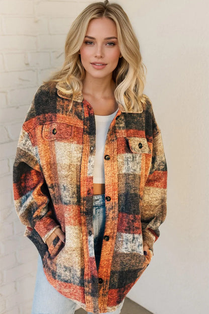 Trendsi Double Take plaid fleece shacket with button-up front and pockets, featuring a cozy, stylish plaid design.