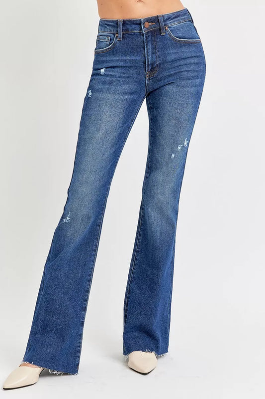 Distressed plus size RISEN full size flare jeans with mid-rise waist, Trendsi brand, shown on a model.