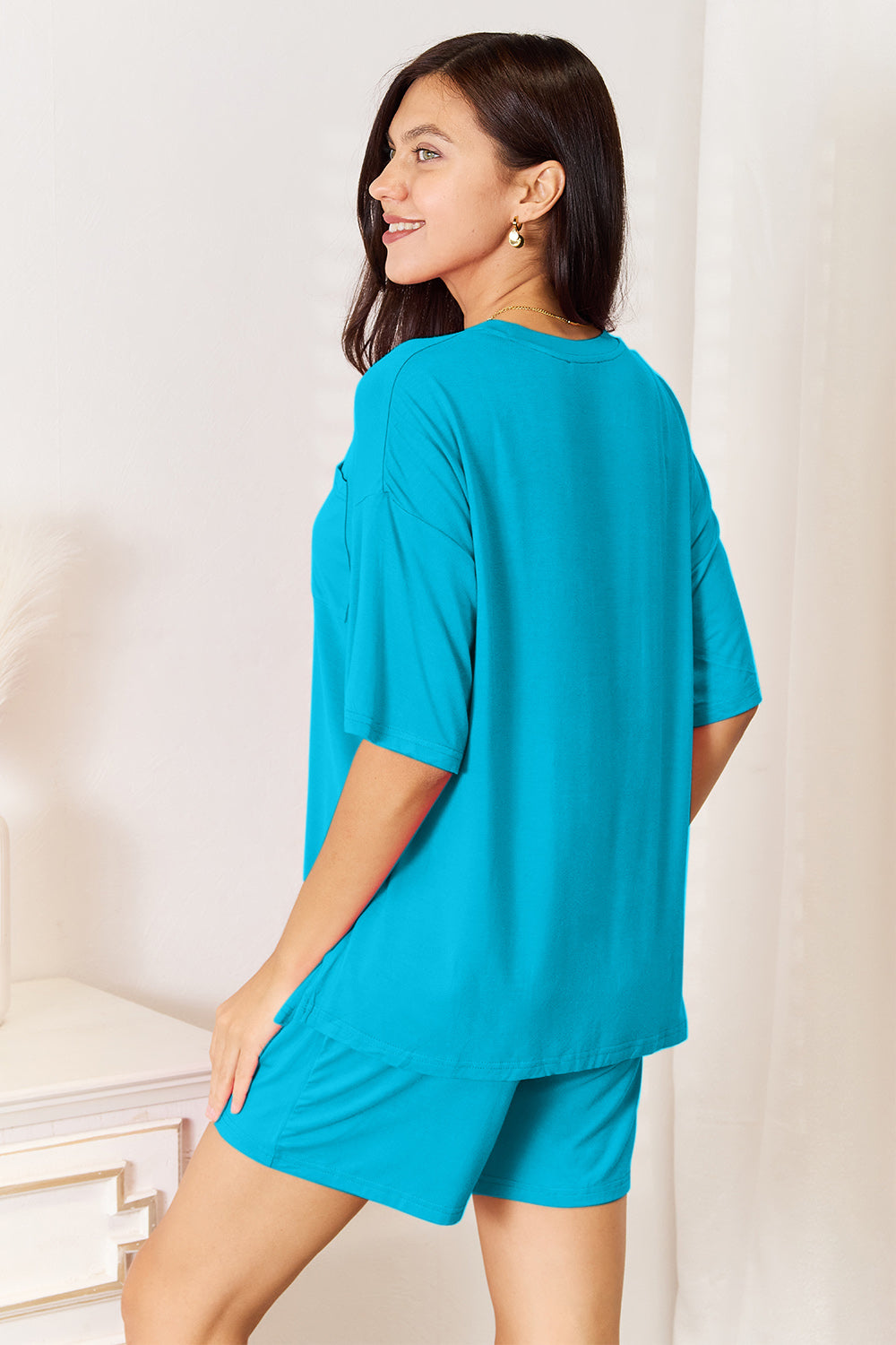 Basic Bae full size soft rayon half sleeve top and shorts set by Trendsi, featuring a comfortable, casual loungewear style.