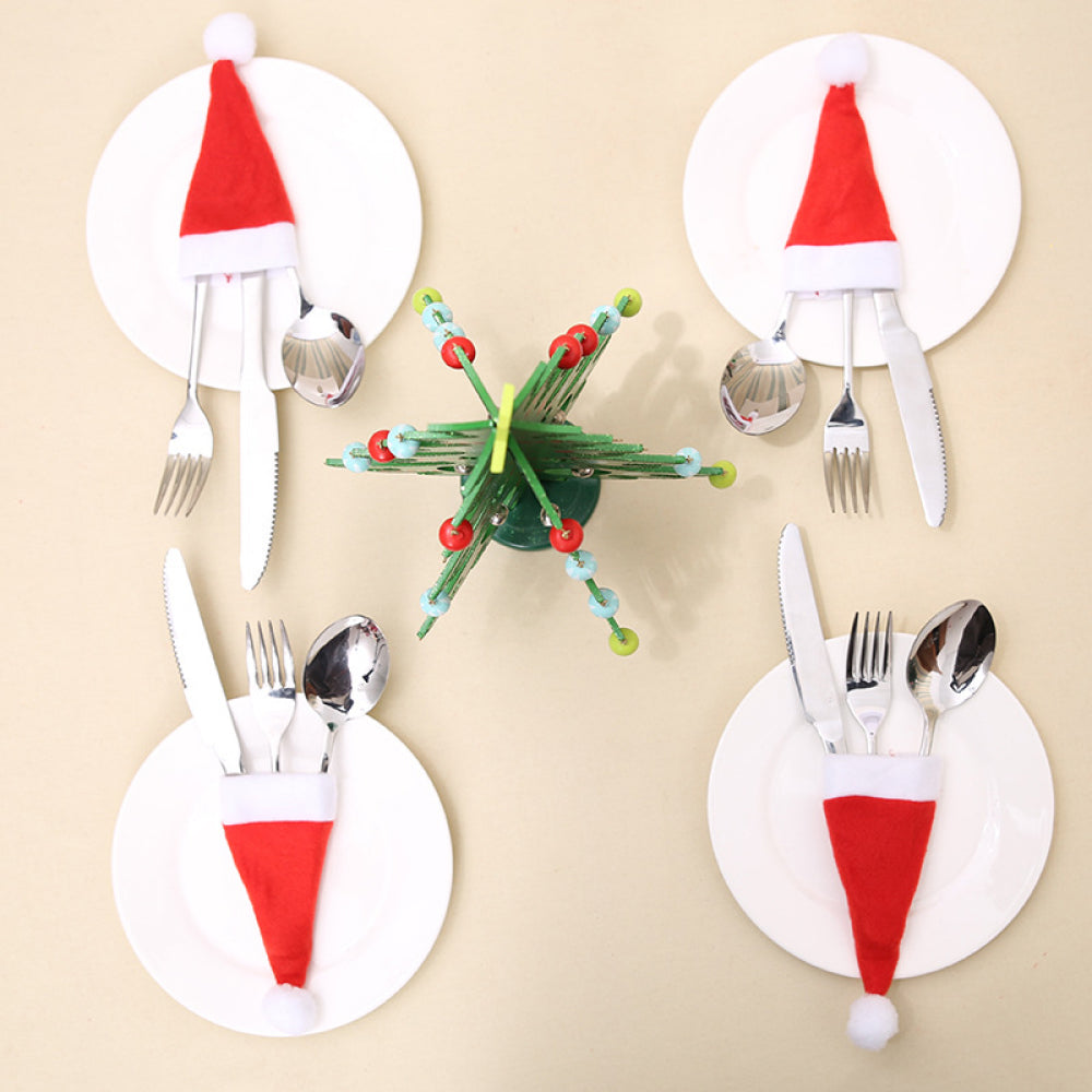 Set of 20 Christmas hat-shaped cutlery holders in festive red and green, perfect for holiday table settings.