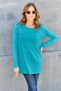 Basic Bae full size round neck long sleeve top by Trendsi, shown in soft fabric with a relaxed fit and classic design.