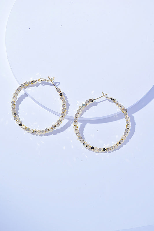 Elegant alloy hoop earrings with geometric bead accents, featuring a stylish and modern design.