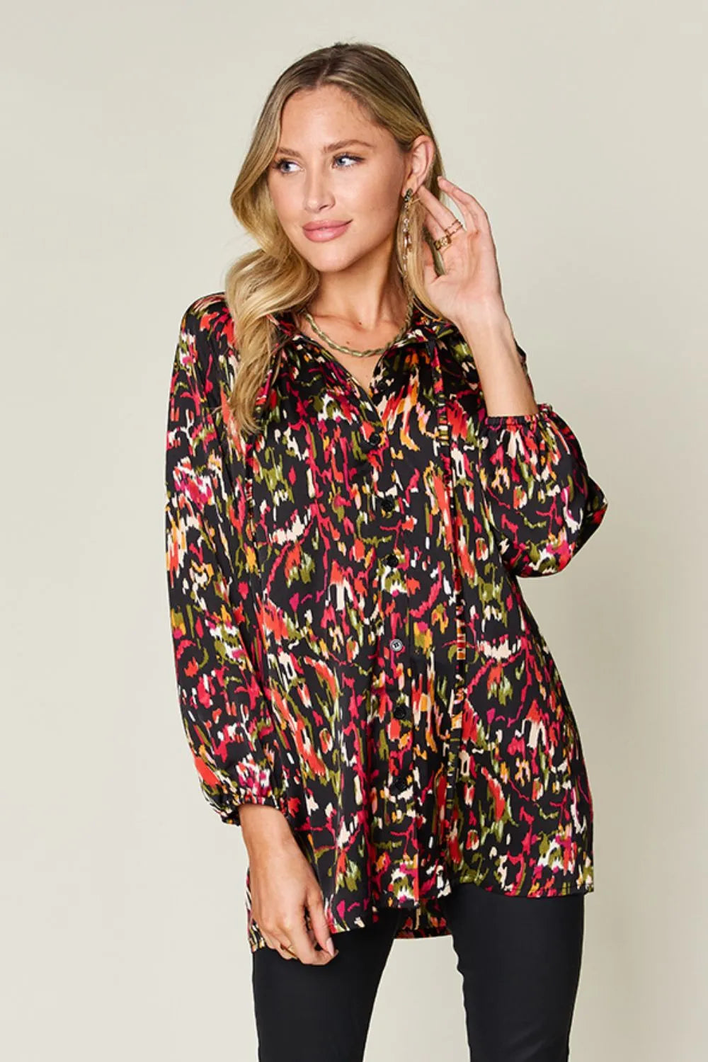 Plus size Double Take printed button-up long sleeve shirt by Trendsi, featuring vibrant pattern and classic collar style.