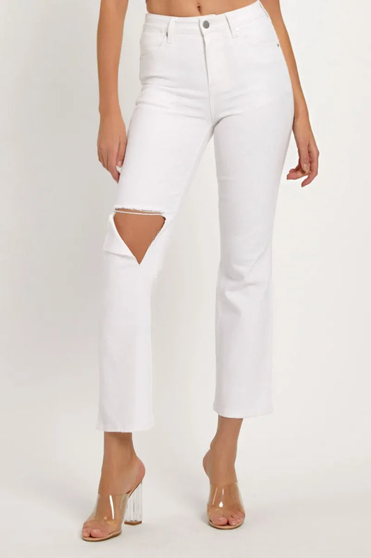 Distressed full size straight crop jeans by Risen featuring a faded wash and ripped details, styled with a relaxed fit.