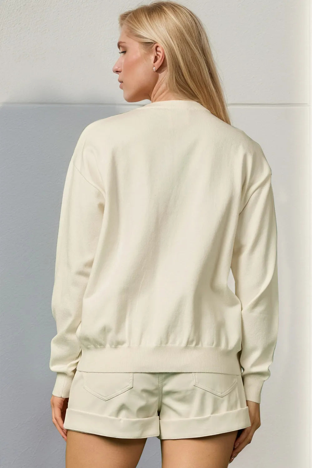 Trendsi Double Take full size sequin Nutcracker long sleeve sweater featuring festive sequin details and cozy knit fabric.