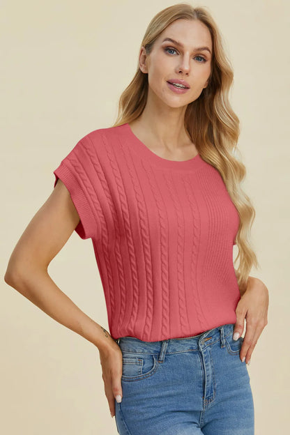 Plus size cable-knit round neck short sleeve sweater by Trendsi, showing a cozy, full-size cable-knit knit with a classic round neckline.