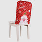 Christmas chair cover by Trendsi featuring festive red and green fabric with holiday-themed patterns for seasonal decor.