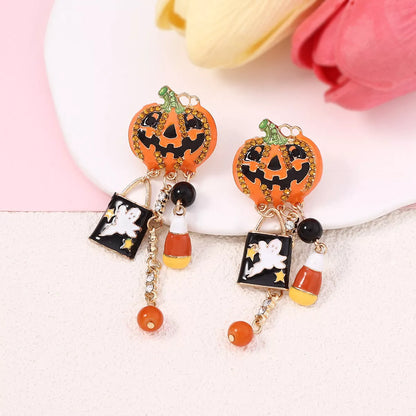 Halloween Pumpkin Ghost Dangle Earrings featuring spooky pumpkin and ghost charms for festive Halloween jewelry.