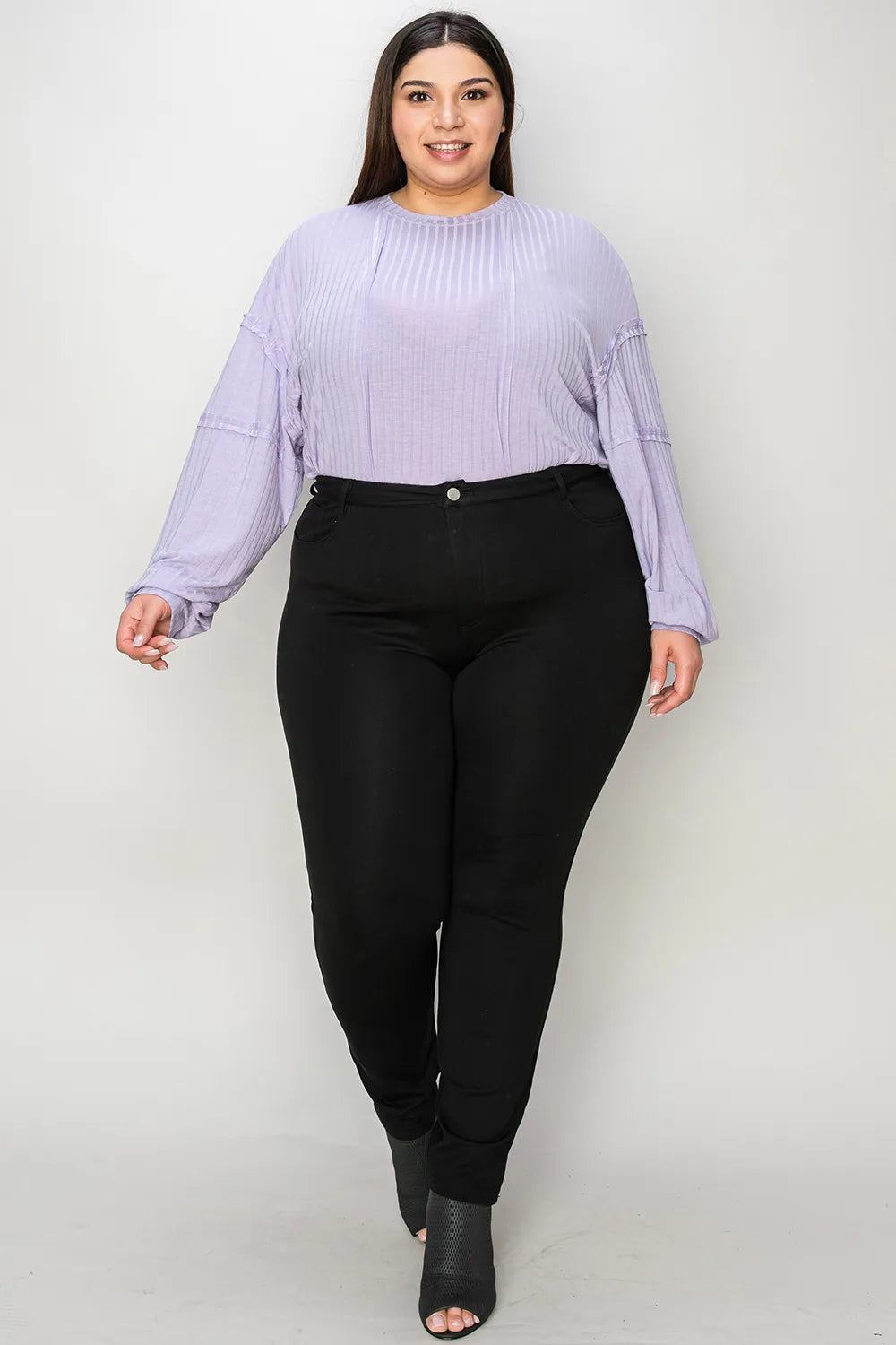 Basic Bae ribbed round neck long sleeve T-shirt by Trendsi, shown in black with a fitted design and long sleeves.