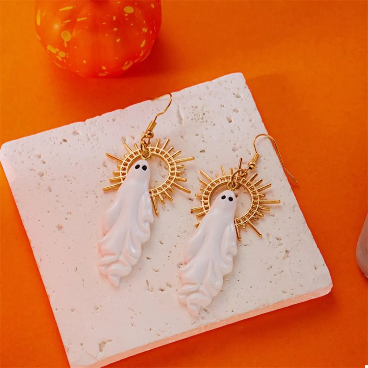 Halloween Sunburst Ghost Drop Earrings by Trendsi featuring ghost-shaped dangles with sunburst design in black and silver tones.