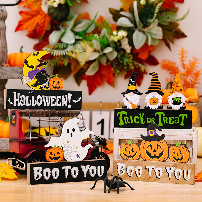 Assorted 2-piece Halloween element ornaments by Trendsi featuring spooky-themed designs for holiday decor.