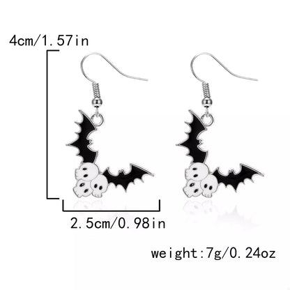 Black Halloween bat drop earrings with detailed wing design, perfect for spooky-themed fashion and costume accessories.