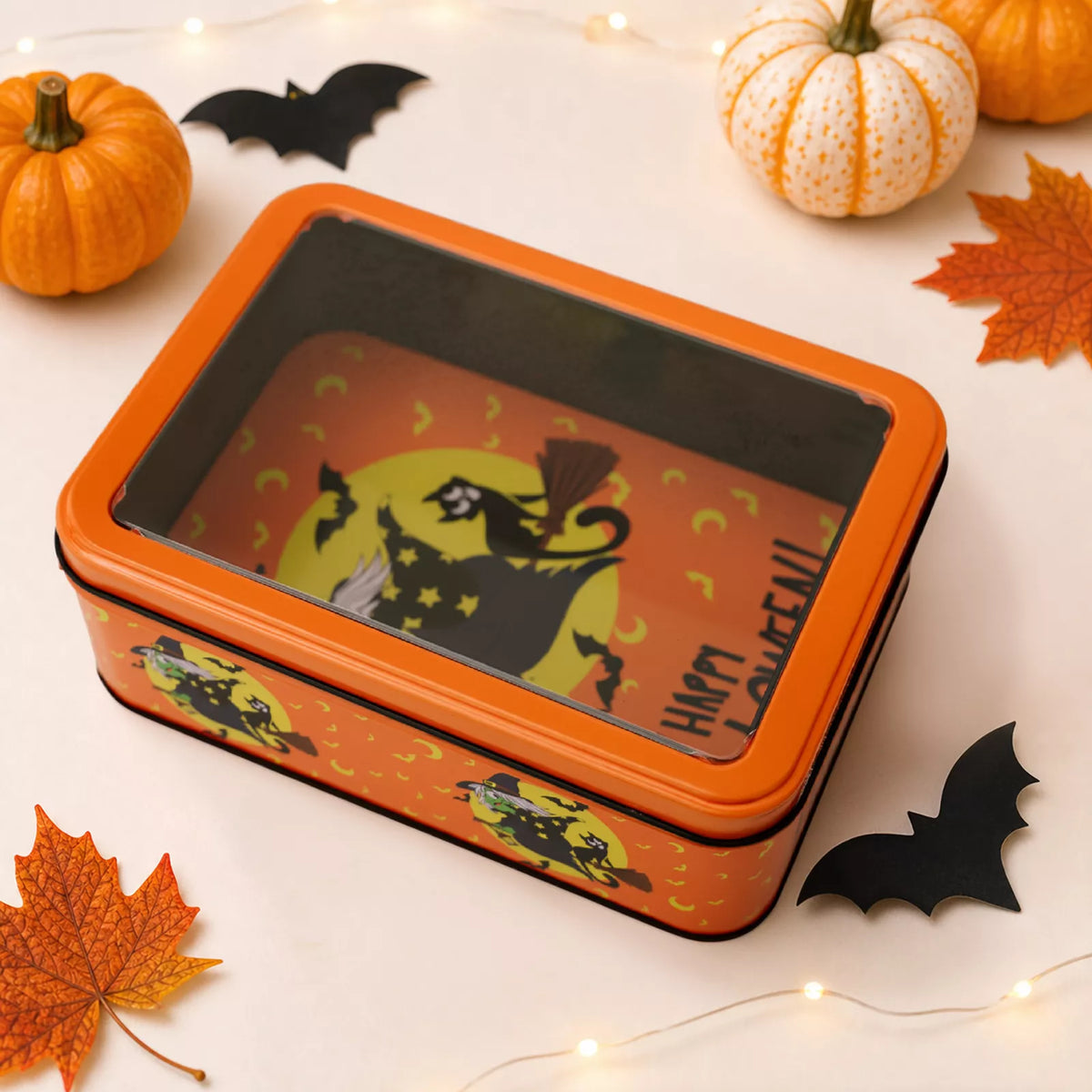 Halloween decorative metal storage box with window display, featuring a spooky design for seasonal home decor.