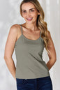Plus size Basic Bae full size round neck slim camisole by Trendsi, showing a close-up of the white, fitted camisole fabric.