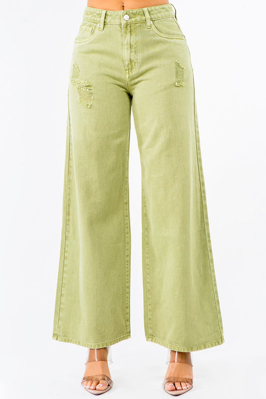 American Bazi high waist distressed wide leg jeans from Trendsi, featuring a relaxed fit and frayed hem, shown on a model.