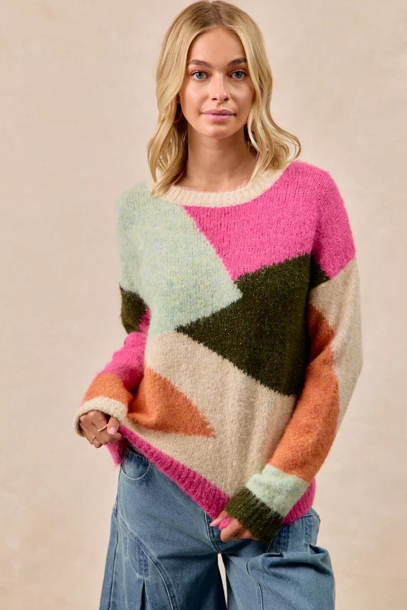 Multi-color block sweater top by Trendsi featuring a cozy knit design and vibrant color blocking, perfect for casual wear.