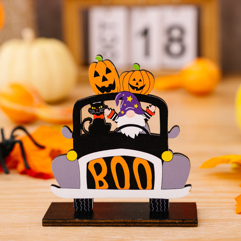 Three Halloween-themed car-shaped ornaments in orange, black, and white with spooky designs, perfect for seasonal car decor.