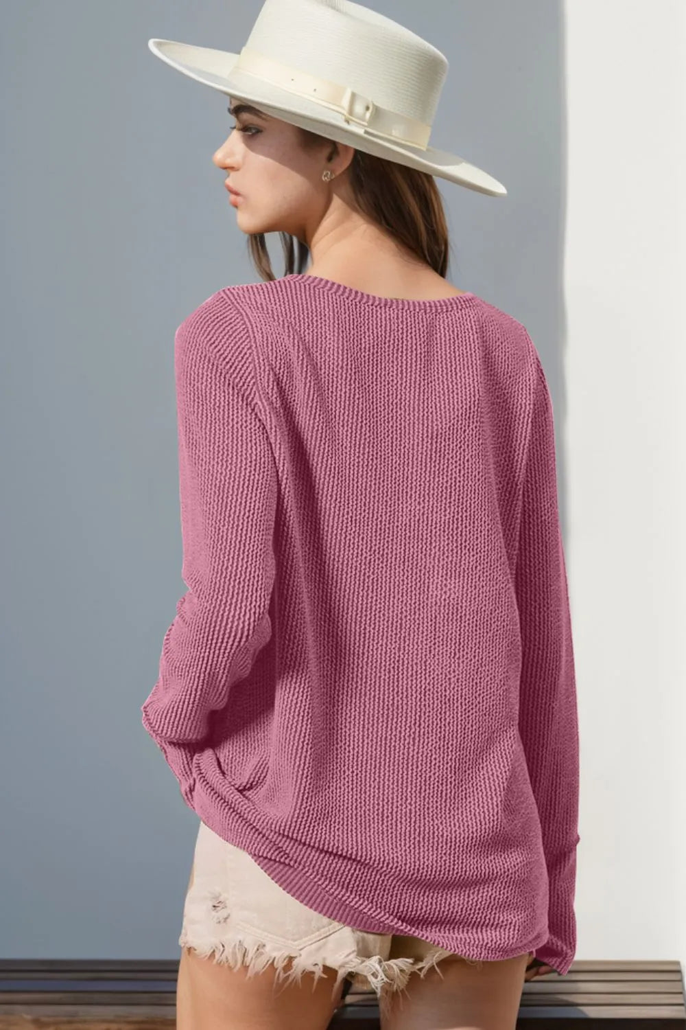 Gray long sleeve T-shirt with notched thumbhole sleeves from Trendsi, featuring a casual fit and stylish design.