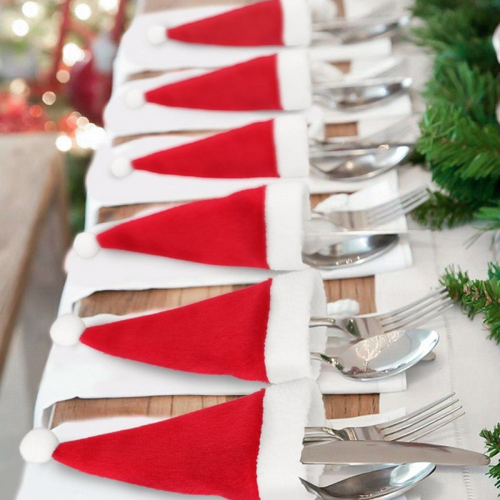 Set of 20 Christmas hat-themed cutlery holders by Trendsi, featuring festive red and green fabric with holiday patterns.