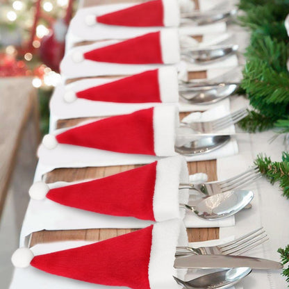 Set of 20 Christmas hat-themed cutlery holders by Trendsi, featuring festive red and green fabric with holiday patterns.