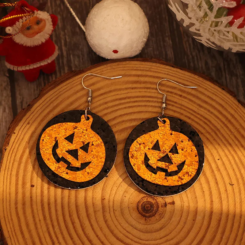 Trendsi PU leather pumpkin earrings with orange and black Halloween-themed design, lightweight jewelry accessory for festive occasions.