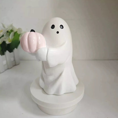Halloween ghost decorative ornament by Trendsi featuring a spooky white ghost figure with black eyes and flowing fabric.