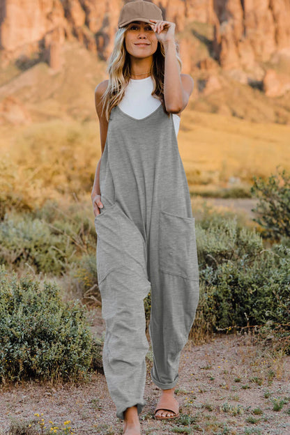 Front view of Trendsi Double Take full-size sleeveless V-neck jumpsuit with pockets, showcasing its stylish design and comfortable fit.
