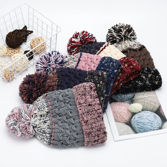Contrast thermal hat with pompom from Trendsi featuring a cozy knit design and playful pompom detail.