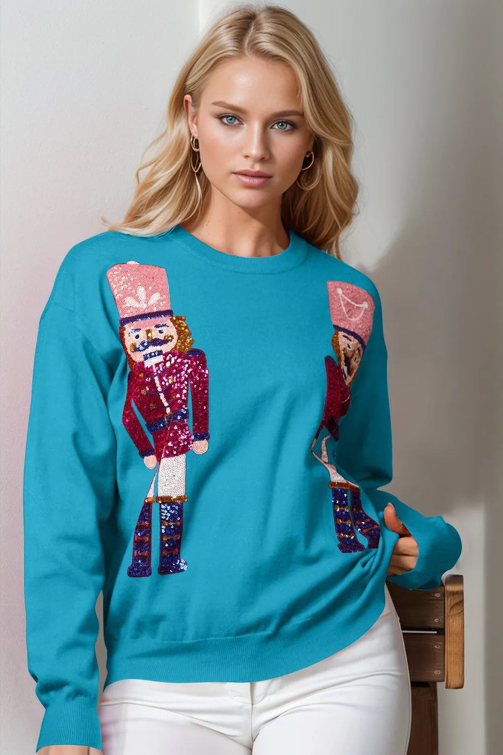 Trendsi Double Take full size nutcracker sequin long sleeve sweater with festive holiday design and colorful embellishments.