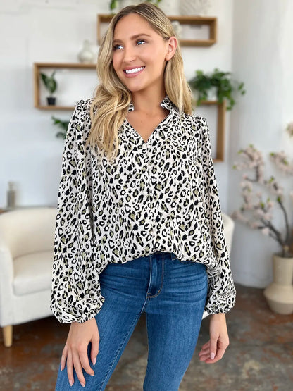 Plus size leopard print long sleeve blouse by Trendsi, featuring a stylish double take design and comfortable fit.