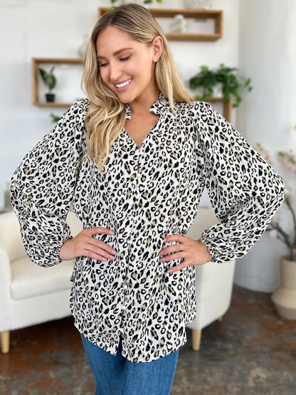 Plus size leopard print long sleeve blouse by Trendsi, featuring a stylish full-size fit and trendy animal print design.