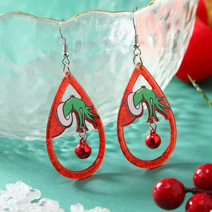 Halloween teardrop earrings by Trendsi featuring spooky ghost and pumpkin designs in silver-tone metal.