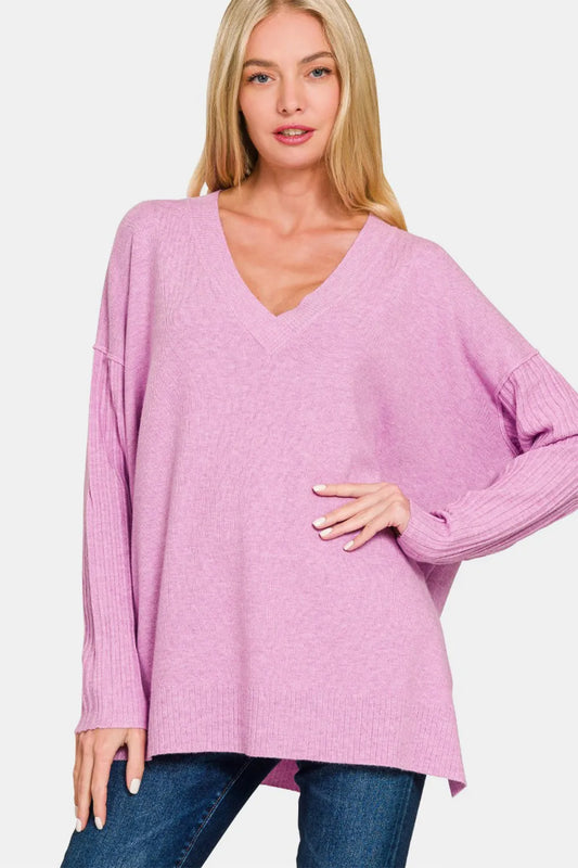 Zenana V-neck side slit high-low sweater in soft knit fabric, featuring a relaxed fit and stylish high-low hem.