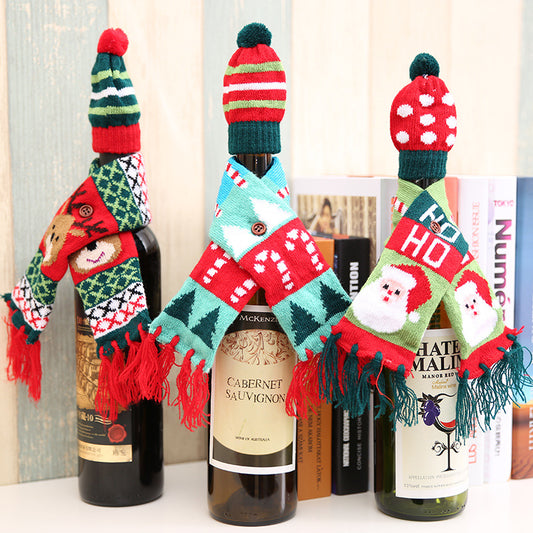Christmas hat and scarf wine bottle decoration by Trendsi, festive holiday accessory for wine bottles with red and white accents.
