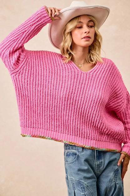 BiBi V-Neck Sweater by Trendsi featuring colorful trim and a soft knit fabric, shown on a model.