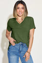Basic Bae full size V-neck high-low T-shirt by Trendsi, shown in black with a relaxed fit and stylish high-low hem.