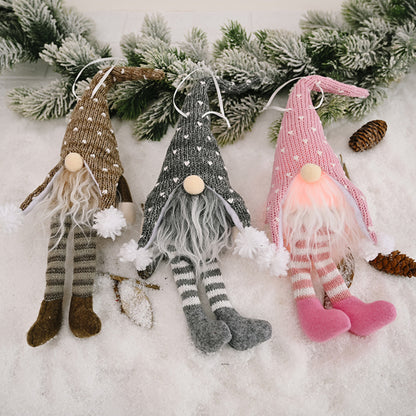 Faceless gnome figurine with long legs and light-up feature, perfect as a whimsical home decor piece.