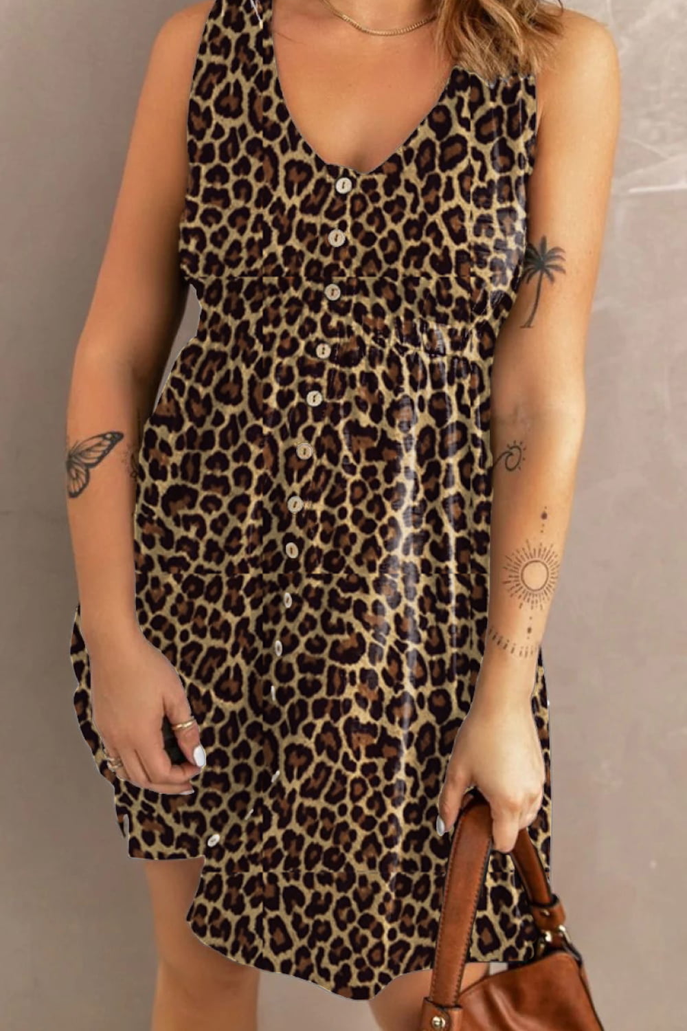 Trendsi double take printed sleeveless casual dress with front buttons, ruched waist, side slit, and pockets, perfect for relaxed style.