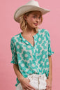 Trendsi BiBi Flower Printed Woven Smocking Sleeves V-Neck Top featuring floral print, lightweight fabric, and stylish design.