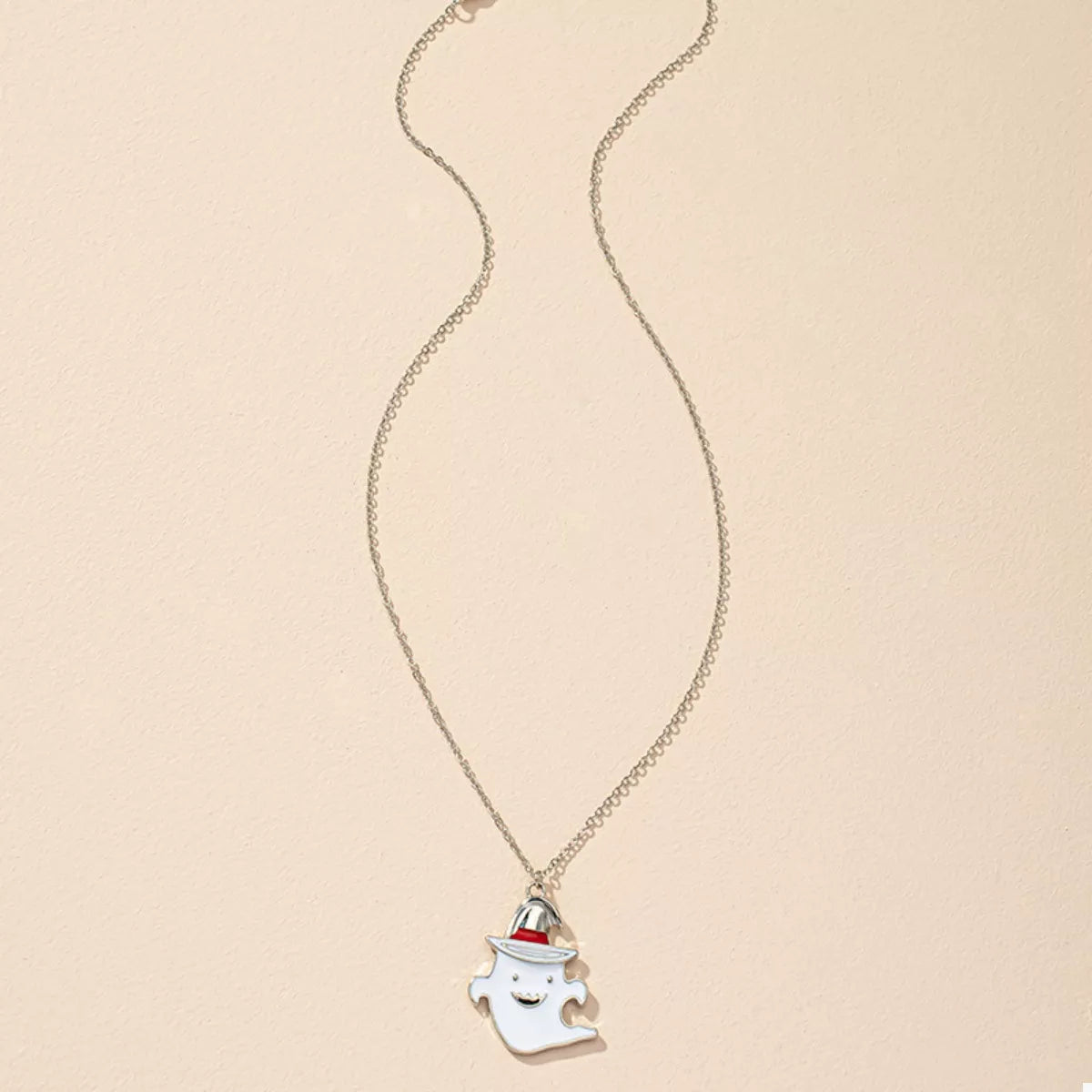 Cute ghost pendant necklace from Trendsi featuring a Halloween-themed charm on a silver chain.