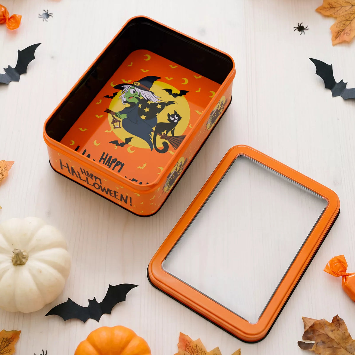 Halloween decorative metal storage box with window display, featuring a spooky design and sturdy metal construction.