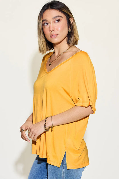 Trendsi Basic Bae bamboo V-neck short sleeve T-shirt in natural color, with a slit design and relaxed fit.